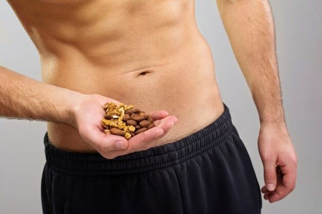 A man who eats nuts to increase his strength
